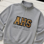 varsity graduation quarter zip styled flat lay