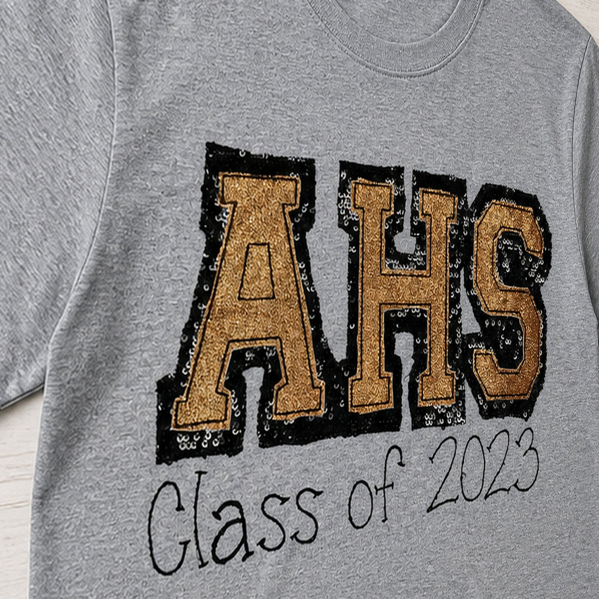 varsity graduation short sleeve embroidery close-up