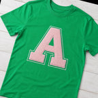 varsity initial short sleeve styled flat lay