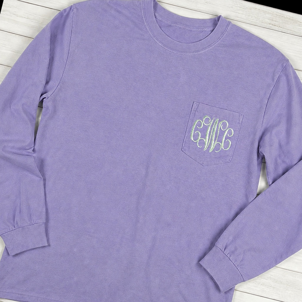 Custom vine monogram long sleeve pocket tee folded flat lay
