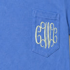 Close-up of the embroidered design on a vine monogram pocket tee