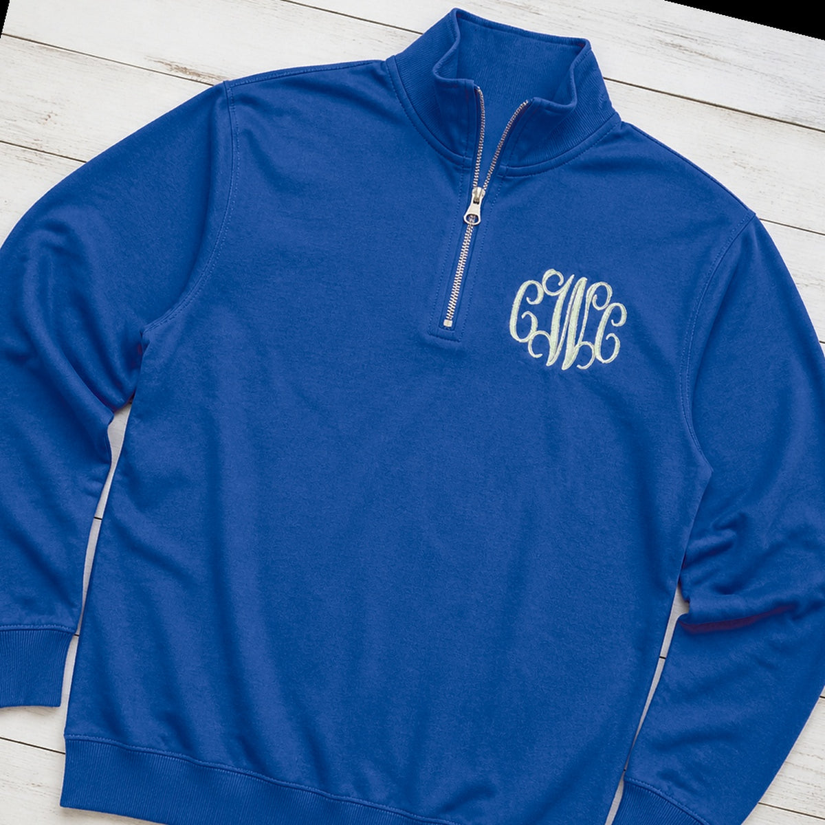 Custom vine monogram quarter zip pullover folded flat lay