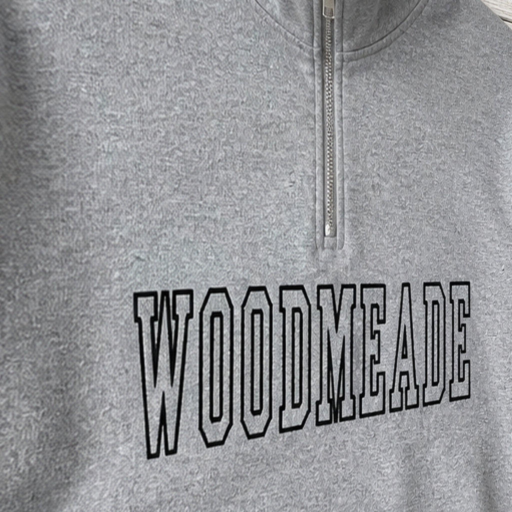 woodmeade outline quarter zip embroidery close-up
